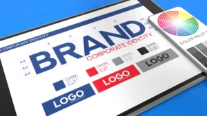 A digital branding design displayed on a tablet and smartphone, featuring logo variations, CMYK color codes, and a color palette, representing corporate brand identity development.