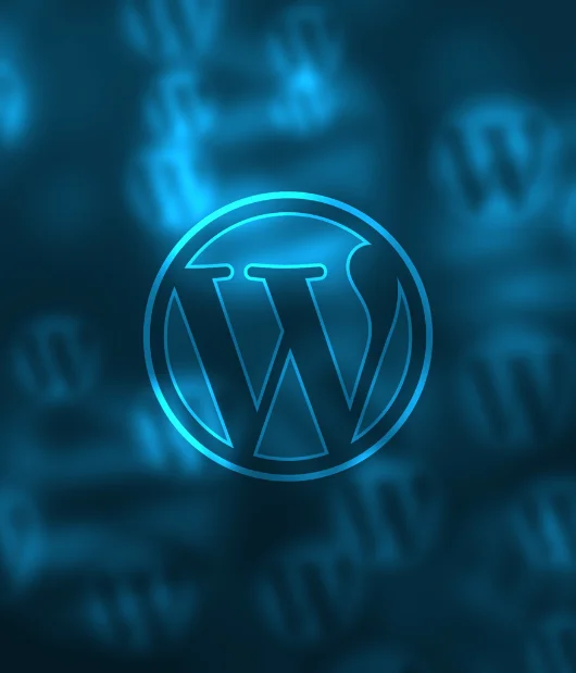 A glowing blue WordPress logo with a digital background, symbolizing website development and content management.